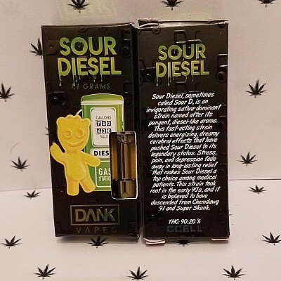 A box of Sour Diesel Dank Vapes with a teddy bear on it, promising a burst of flavor with Sour Apple and Sour Diesel cartridges